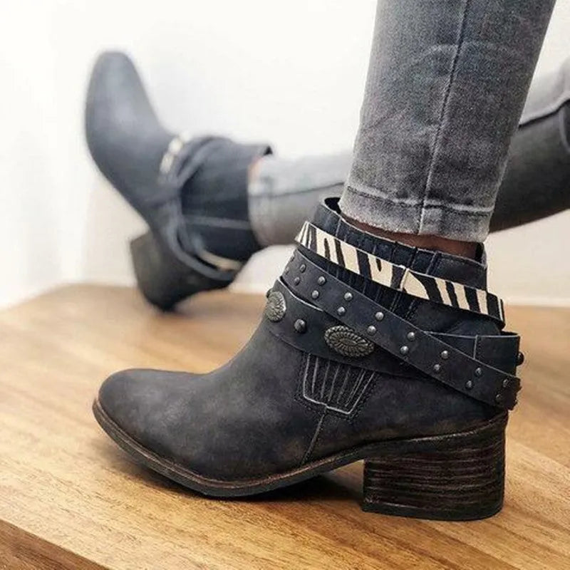 Vintage women's black high heel shoes with tassel detail and back-tie fastening