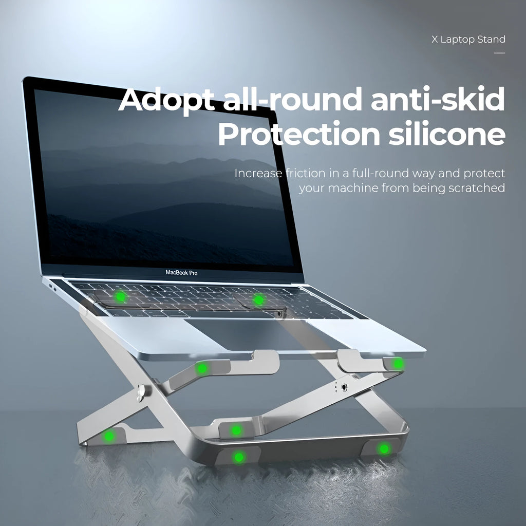 Folding silver grey aluminium laptop stand with silicone pads in expanded position showing heat dissipation design