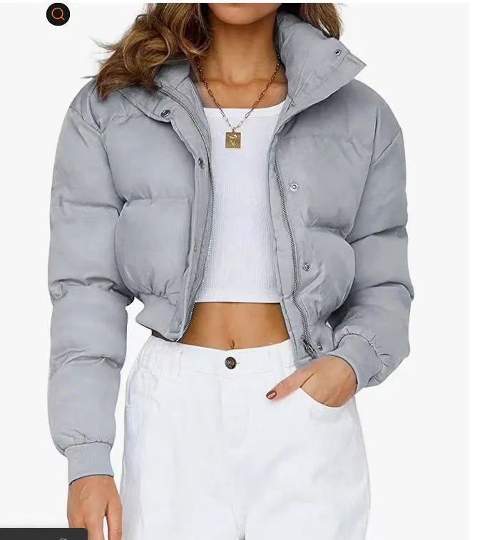 A woman's loose-fitting long sleeve polyester jacket in a choice of colours.