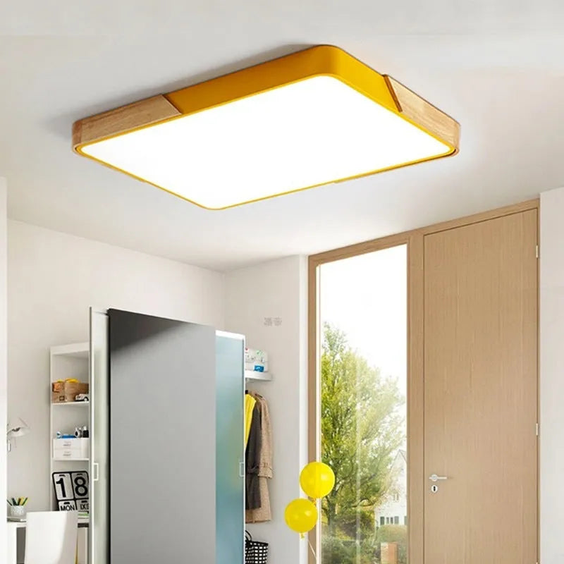 Round 30cm macaron-shaped LED ceiling light with plastic shade in multiple colour options