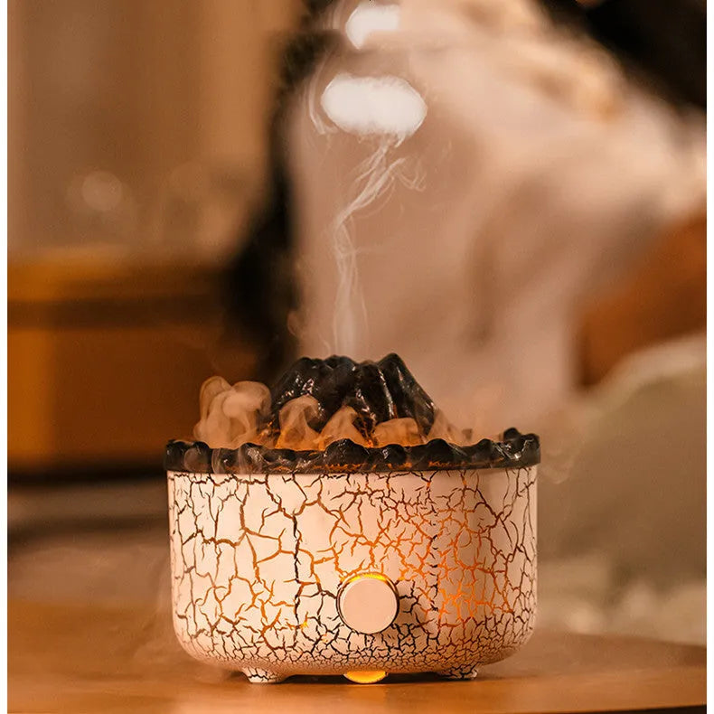 Volcano-shaped humidifier with LED flame effect emitting mist rings for atmospheric room enhancement