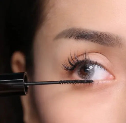 Waterproof mascara in natural black shade for curling and lengthening lashes with professional hold