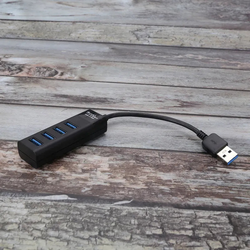 USB 3.0 hub with 4 ports, LED indicators, and 30cm connecting cable for laptop and desktop computers