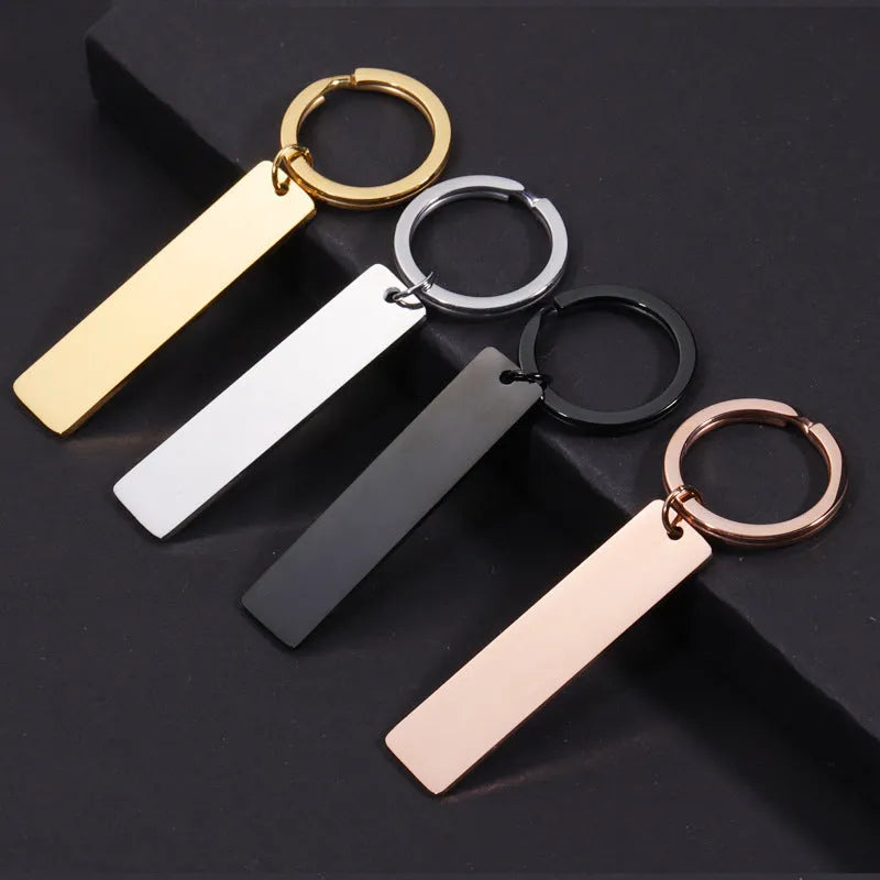 Stainless steel keychain with laser-engraved Spotify code in rose gold finish, rectangular pendant