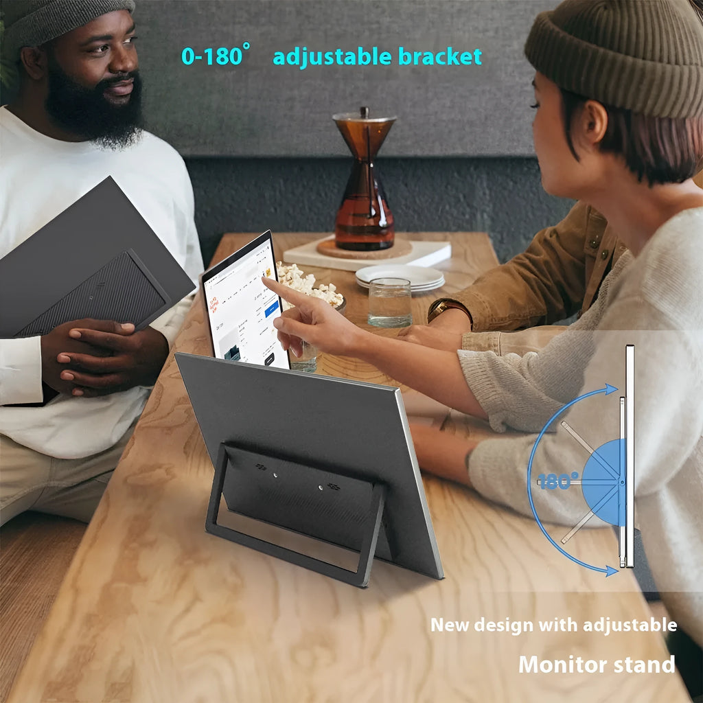 Black 15.6 inch portable monitor with adjustable stand on desk with connected cables