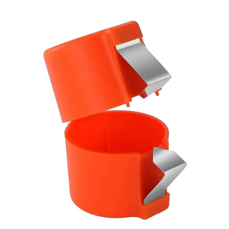 Egg shell opener and beater kitchen tool in pink, yellow, or orange colour on a kitchen counter.