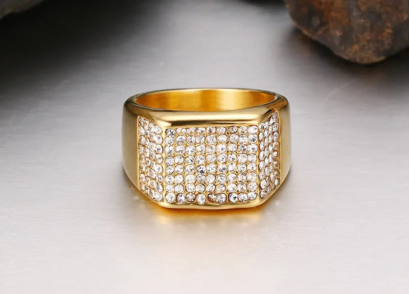 Gold titanium steel men's ring with geometric diamond-treated surface, available in sizes 7 to 12.
