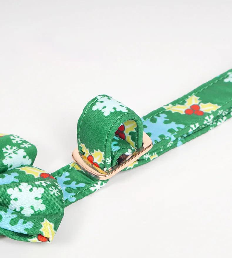 Pure cotton dog necklace with removable red bow tie on a light background showing size options