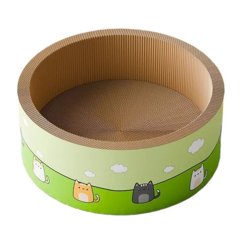 A large round corrugated cardboard cat scratch board with a deep, textured pit design on a wooden floor.