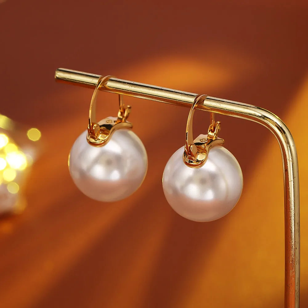 Pearl earrings for women with round geometric shape, environmentally friendly copper and real gold plating, one pair