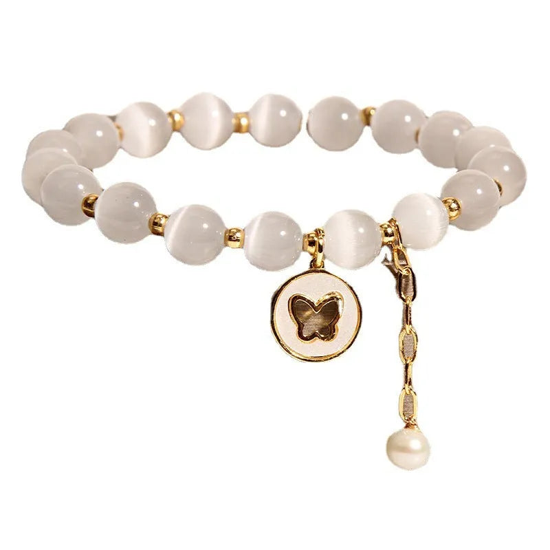 White cat's eye crystal geometric bracelet with adjustable clasp for women.