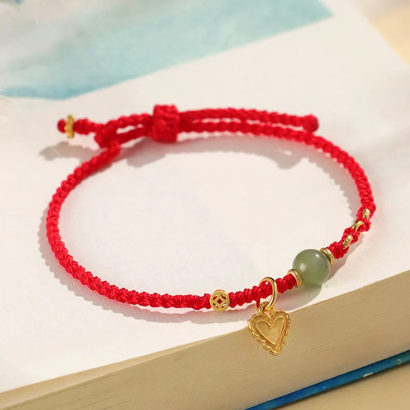 Handmade woven women's bracelet with 925 silver and red Hetian jade beads on adjustable carrying strap