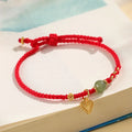 Handmade woven women's bracelet with 925 silver and red Hetian jade beads on adjustable carrying strap