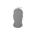 White 3D fish scale pattern bath sponge with hang loop on a bathroom background.