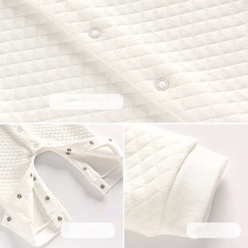 White long sleeve cotton baby romper for boys in sizes from 59cm to 90cm.