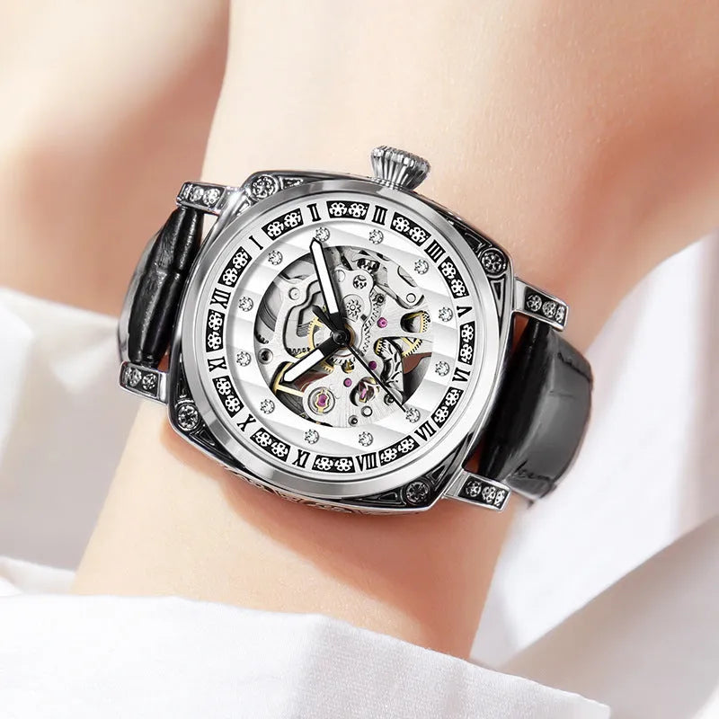Black dial mechanical wristwatch with luminous hands on a brown leather strap, showing 10m water resistance.