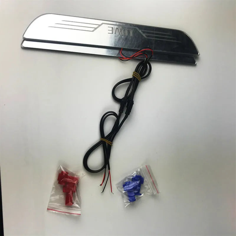 Set of 4 plastic custom-style car threshold strips with LED welcome light for automotive interior
