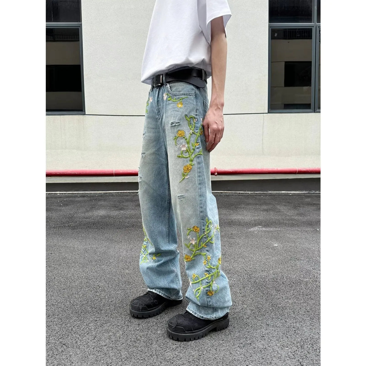 High street casual wide leg denim trousers in blue, mid waist zip fly style, straight leg cut