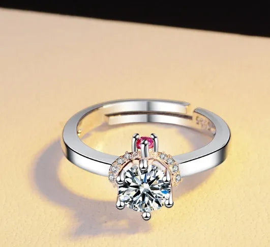 Classic six claw simulated diamond engagement ring plated in 18k white gold with round cut centre stone.