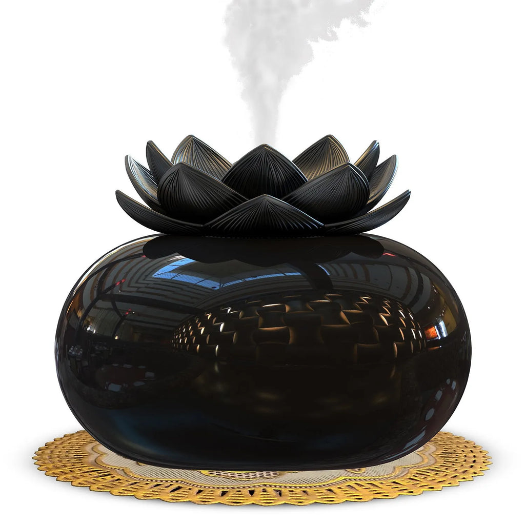 Round pure black lotus aromatherapy ultrasonic humidifier with USB cable.