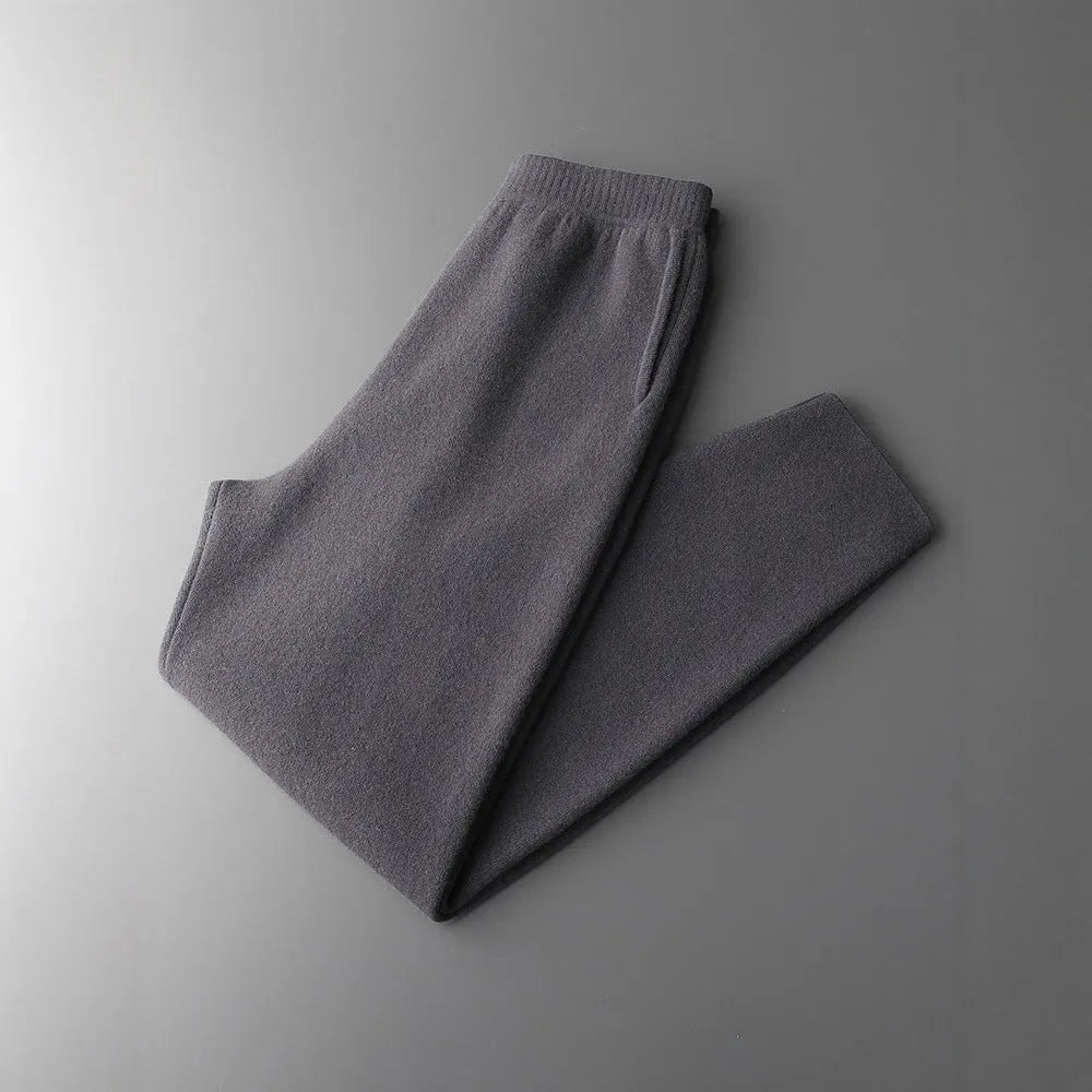 Men's thick cashmere high waist tapered trousers in Black, Elephant Grey, and Raw Velvet, full length, sizes M to XXL.