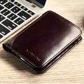 Men's black genuine leather bifold wallet open, showing eight card slots and a zipped coin compartment.