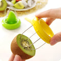 Mini kiwi cutter peeler slicer with stainless steel blade and ABS body on a kitchen surface