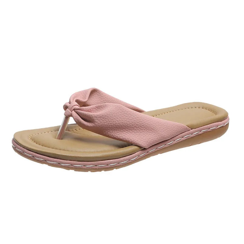 Clip toe bow slippers for women in beige, open-toe flip flop style with rubber sole
