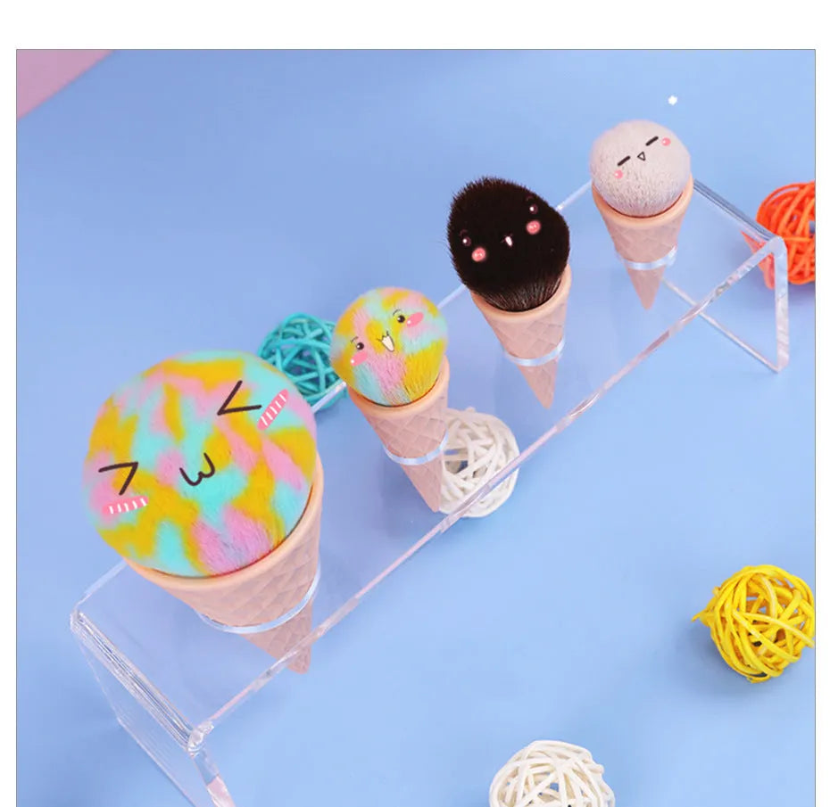 Set of 4 ice cream themed makeup brushes with artificial fibre bristles and plastic handles in paper box
