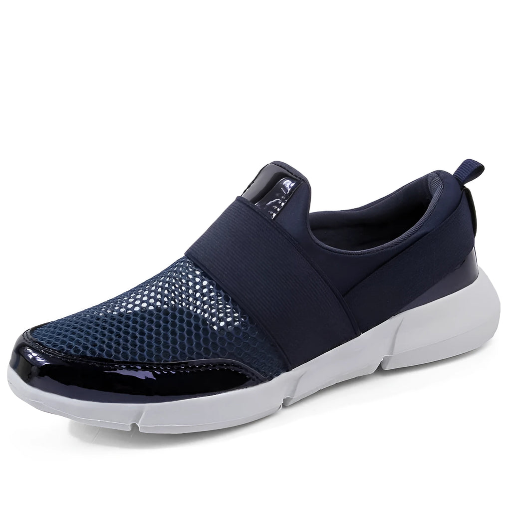 Blue, black and grey women's low-top mesh sneakers on a plain background.