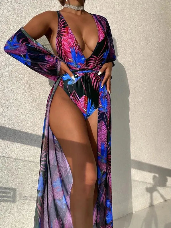 Women's three-piece polyester swimsuit bikini set with a matching coat in a pattern design.