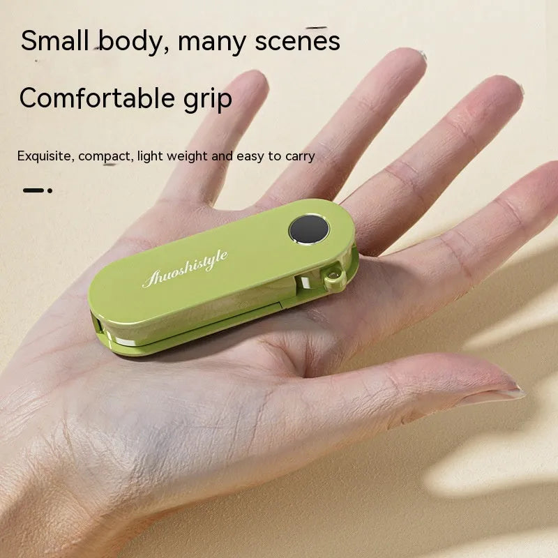 Foldable vegetable peeler with stainless steel blade and ABS handle, 91x36x18mm, shown in green