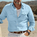 Men's loose fit long-sleeved shirt in cotton linen blend, shown in solid green colour.