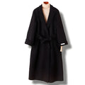 Long wool coat with suit collar in black and caramel colours showing front styling