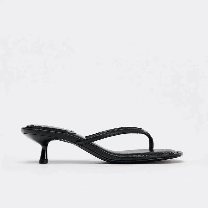 Women's khaki round toe flip-flop sandals with a mid heel on a plain background.