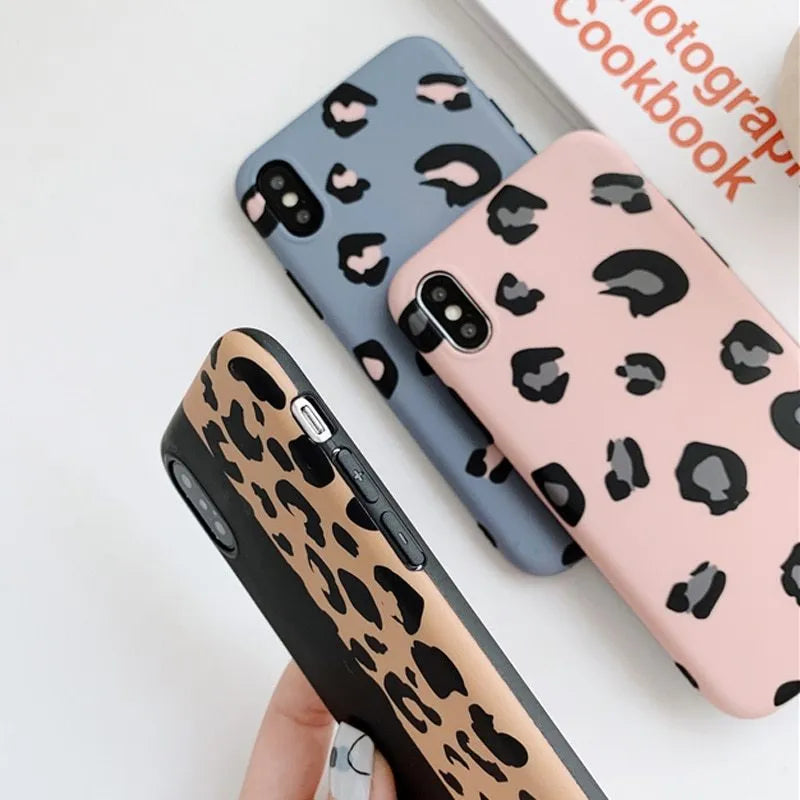 Leopard print iPhone case showing animal pattern design on black background