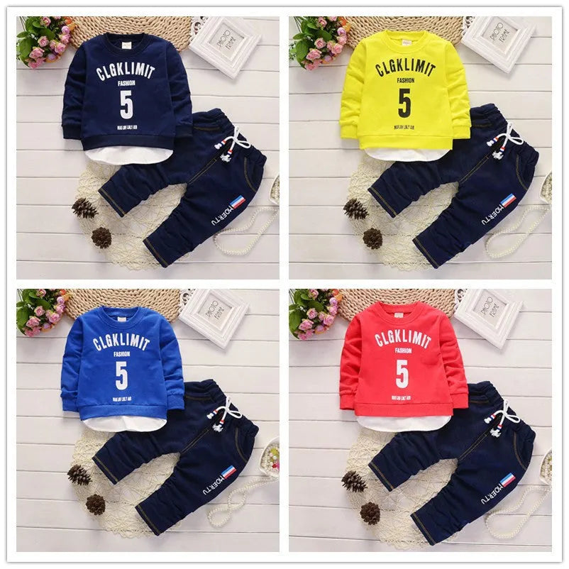 Boys red cotton tracksuit two-piece set with long sleeves and letter print on white background