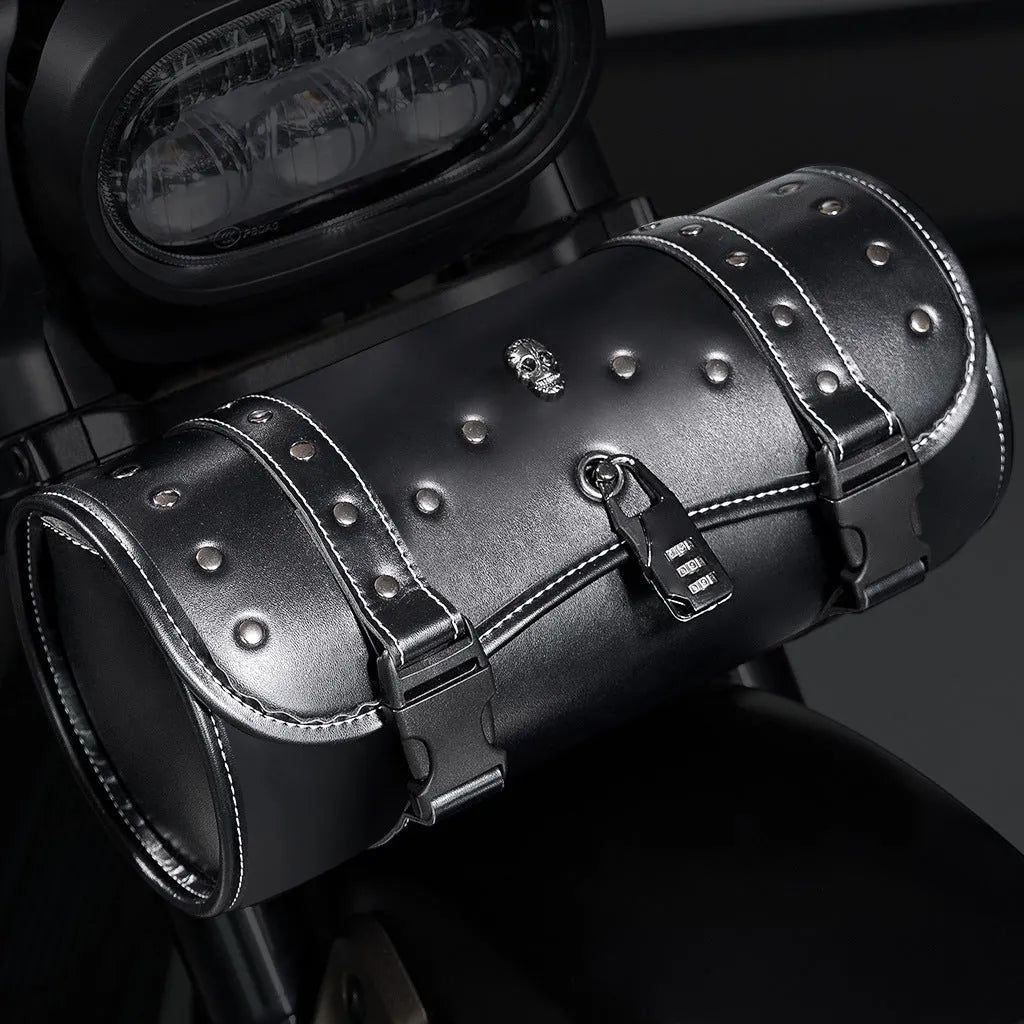 Black punk retro style PU leather motorcycle pannier side bag mounted on a luggage rack.