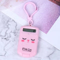 Cookie-shaped mini calculator with key ring in pink, blue, grey, or black, 6.4 x 3.6 x 11.2 cm plastic body