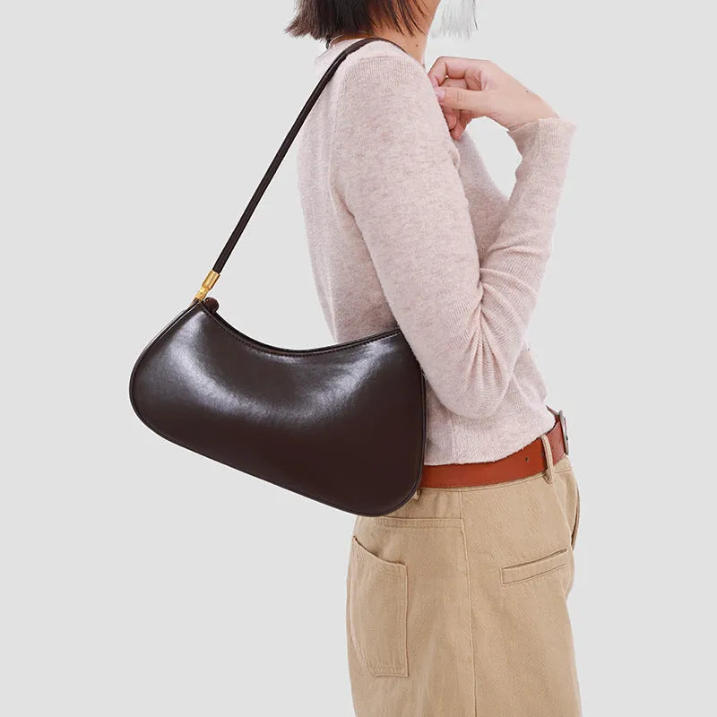 Women's oval PU leather underarm bag in retro style with single shoulder strap
