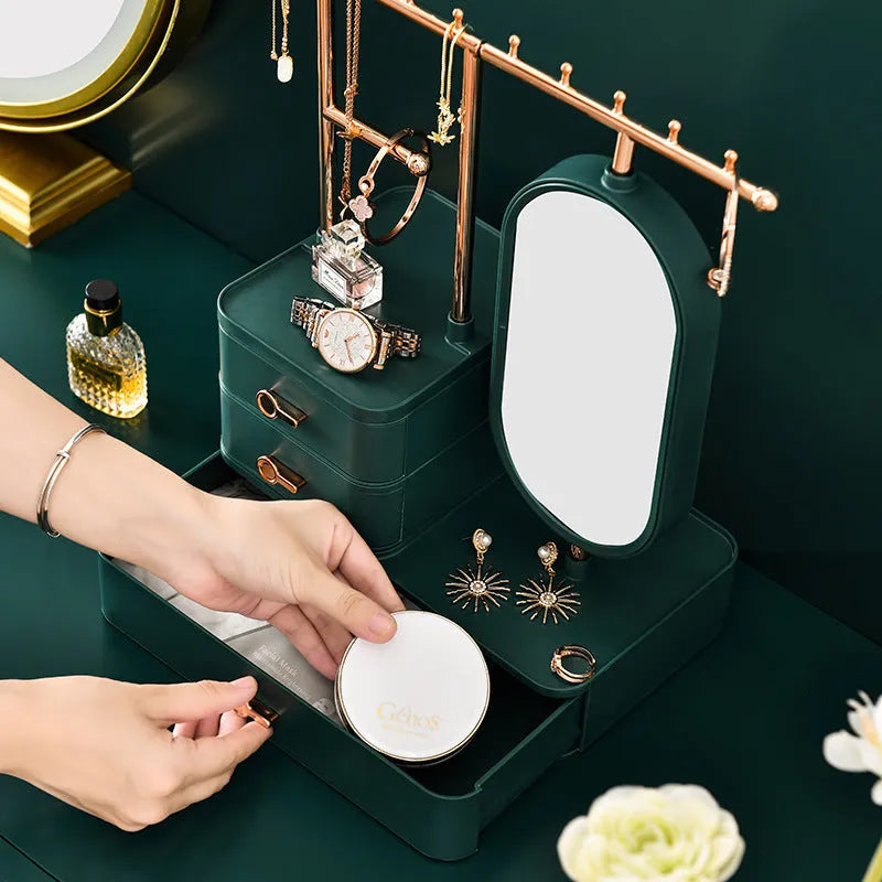 Cosmetics storage box with mirror in pearl white plastic, 27x17x18cm, on desktop with makeup items