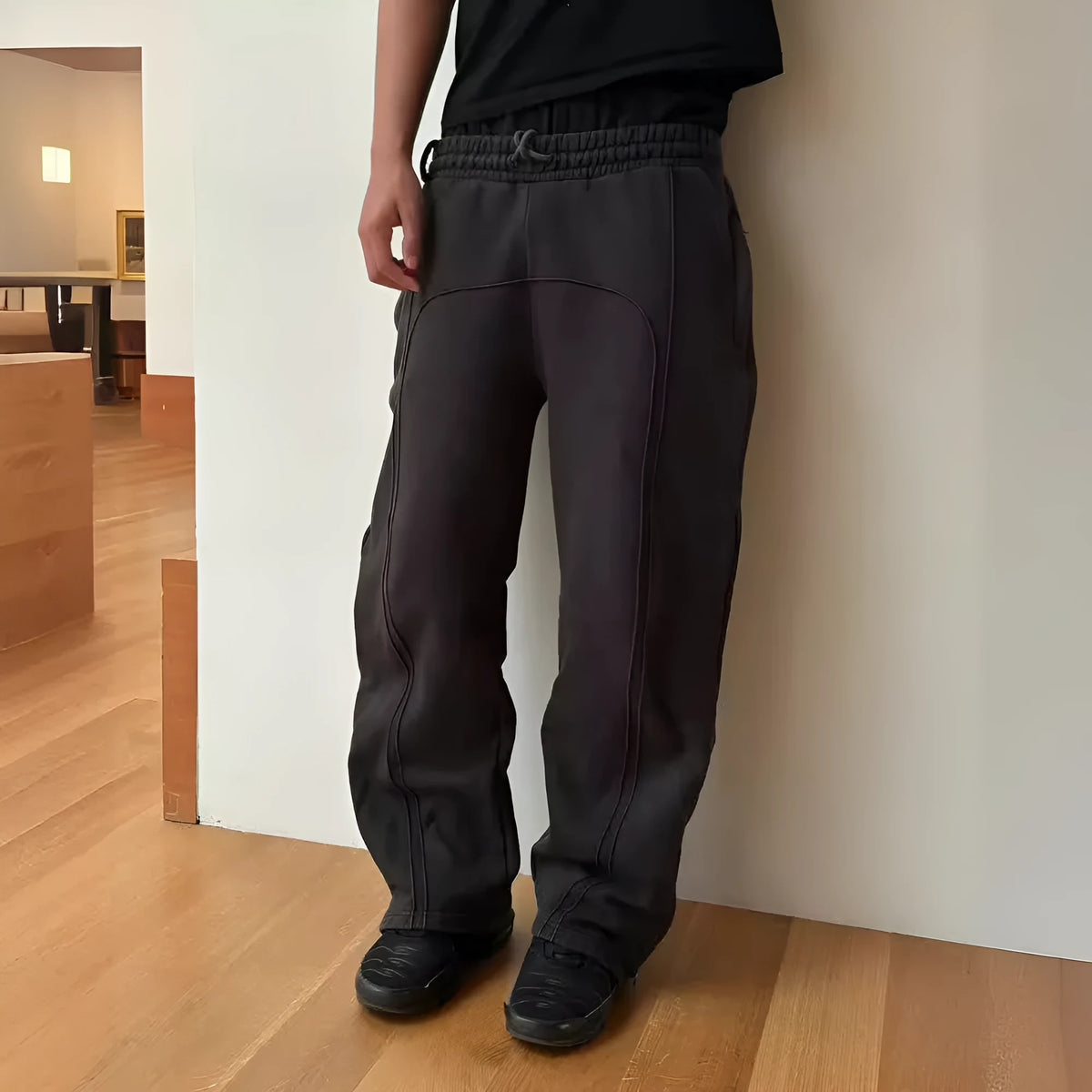Men's loose cropped polyester sweatpants with quilted tooling style in black, grey, or green