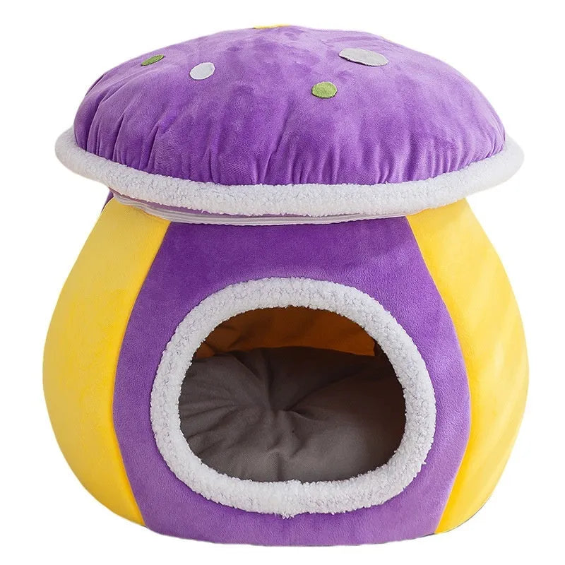 Grey mushroom-shaped plush cat bed with a detachable blanket inside, shown on a wooden floor.