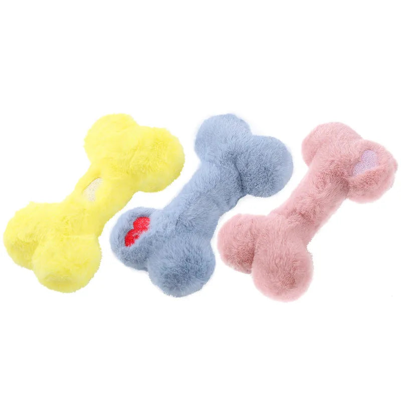 Blue love bone plush dog toy with vocal sound unit and squeaker for interactive chewing play.