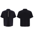 Men's black polo t-shirt with heavy embroidery and sequin decoration, square collar, and short sleeves.