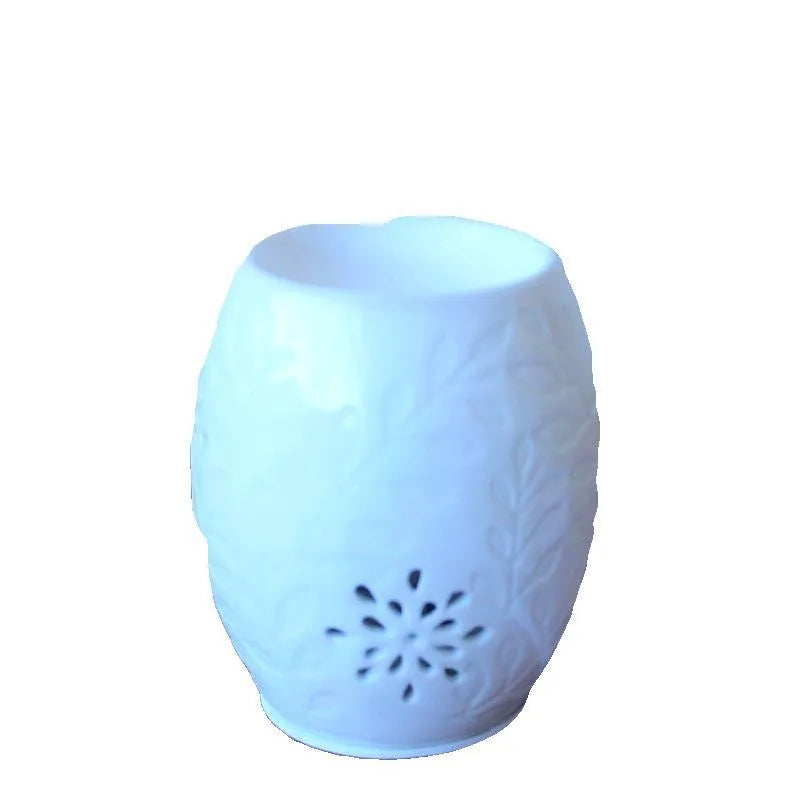 White porcelain ceramic aroma lamp with glazed pavilion pattern, incense burner and hanging ornament in EU and UK sizes.