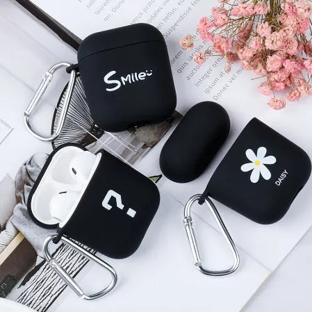 PC AirPods cover with decorative flower design on black background
