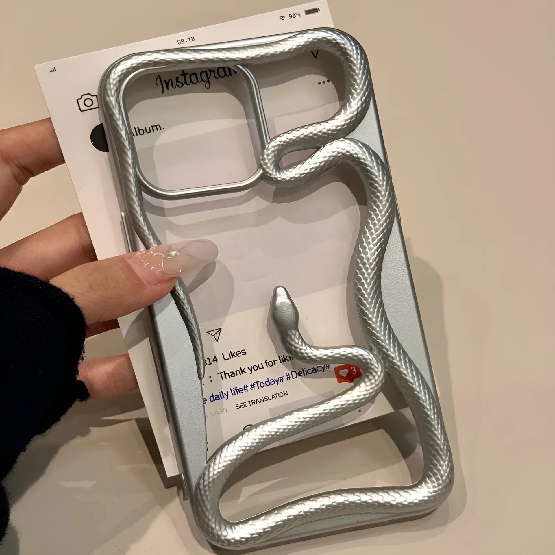 Creative hollow snake TPU phone case in matte rose pink for iPhone