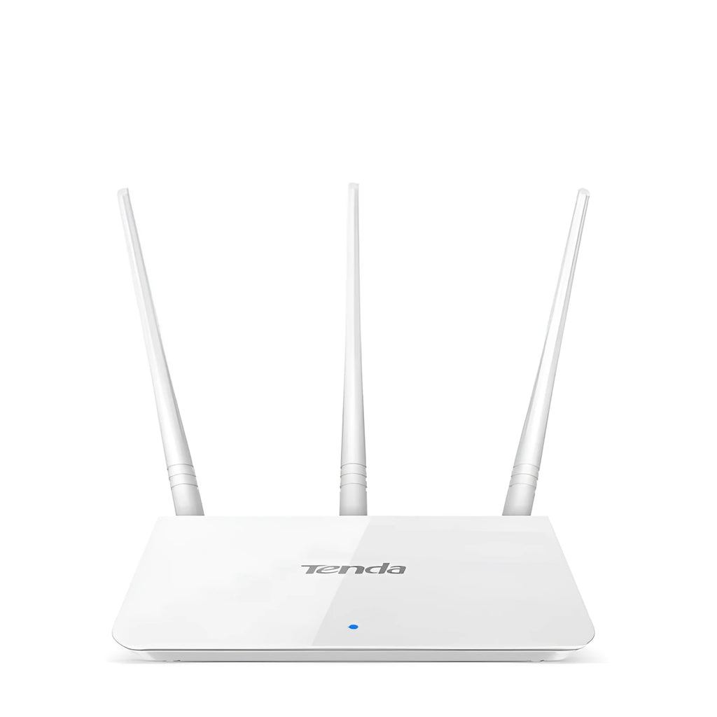 White dual-band wireless broadband router with UK-style three-pin plug on a wooden desk.