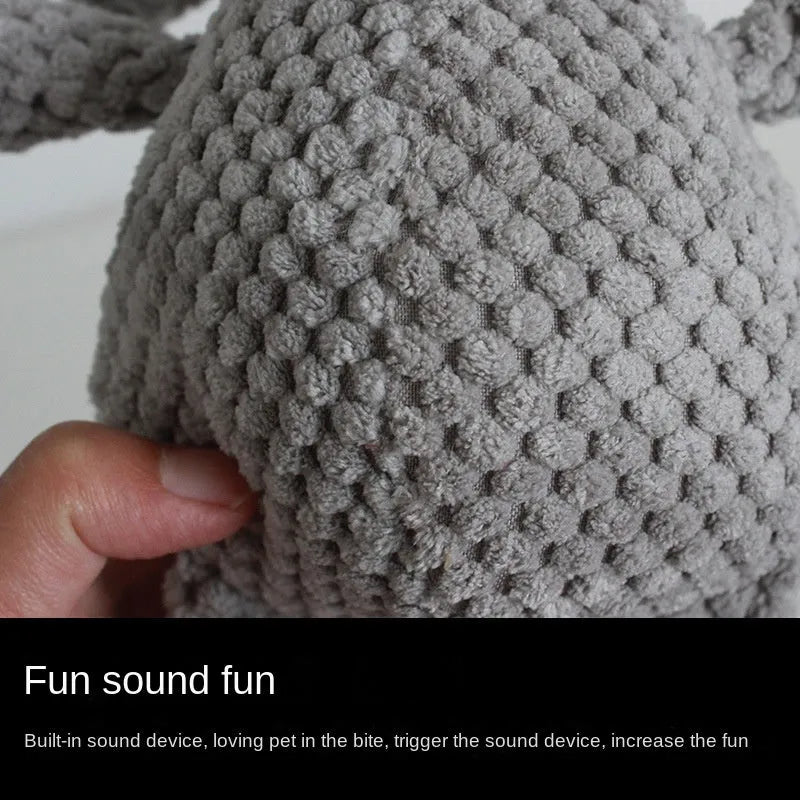 Assorted plush dog chew toys in donkey, elephant, orangutan, and rabbit shapes with squeakers.